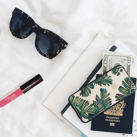 Resort Travel Essentials Sun Glasses Lip Gloss and Passport